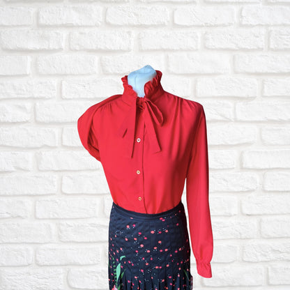Red 80s secretary blouse with high frill collar and tie neck. Approx UK size 10-12