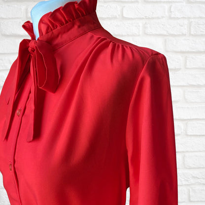 Red 80s secretary blouse with high frill collar and tie neck. Approx UK size 10-12