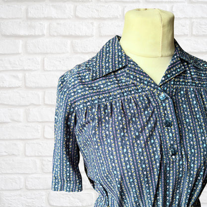 70s blue floral short sleeved cotton peplum blouse with drawstring waist. Approx UK size 14 -18