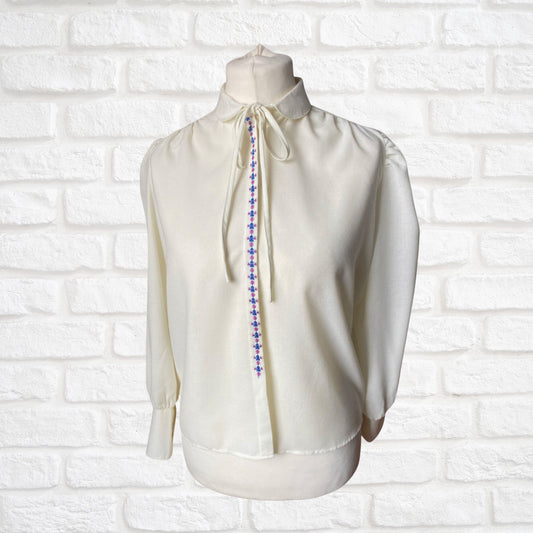 80s cream blouse with pink and blue floral embroidery and Peter Pan collar. Approx U.K. size 12-14