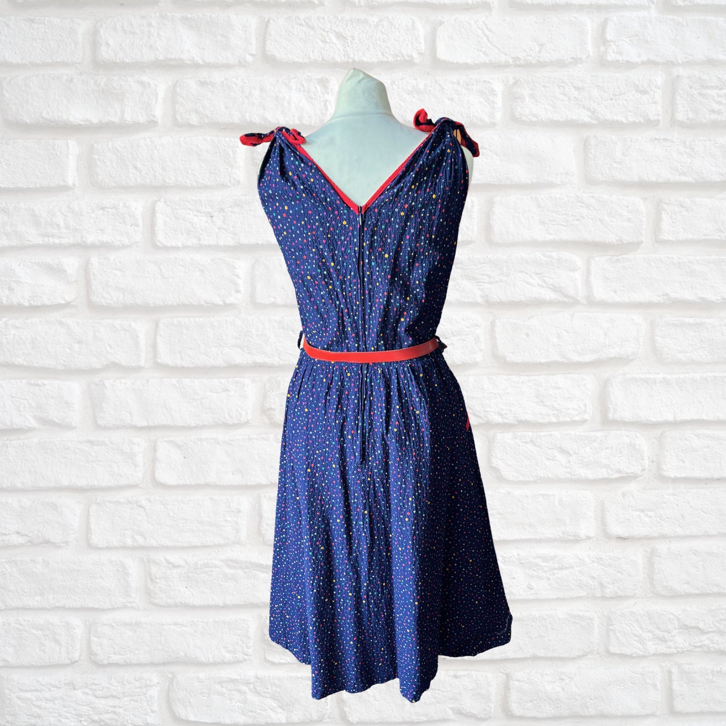 70s dark blue and rainbow polka dot sundress with red trim and belt. Approx UK size 10- 12