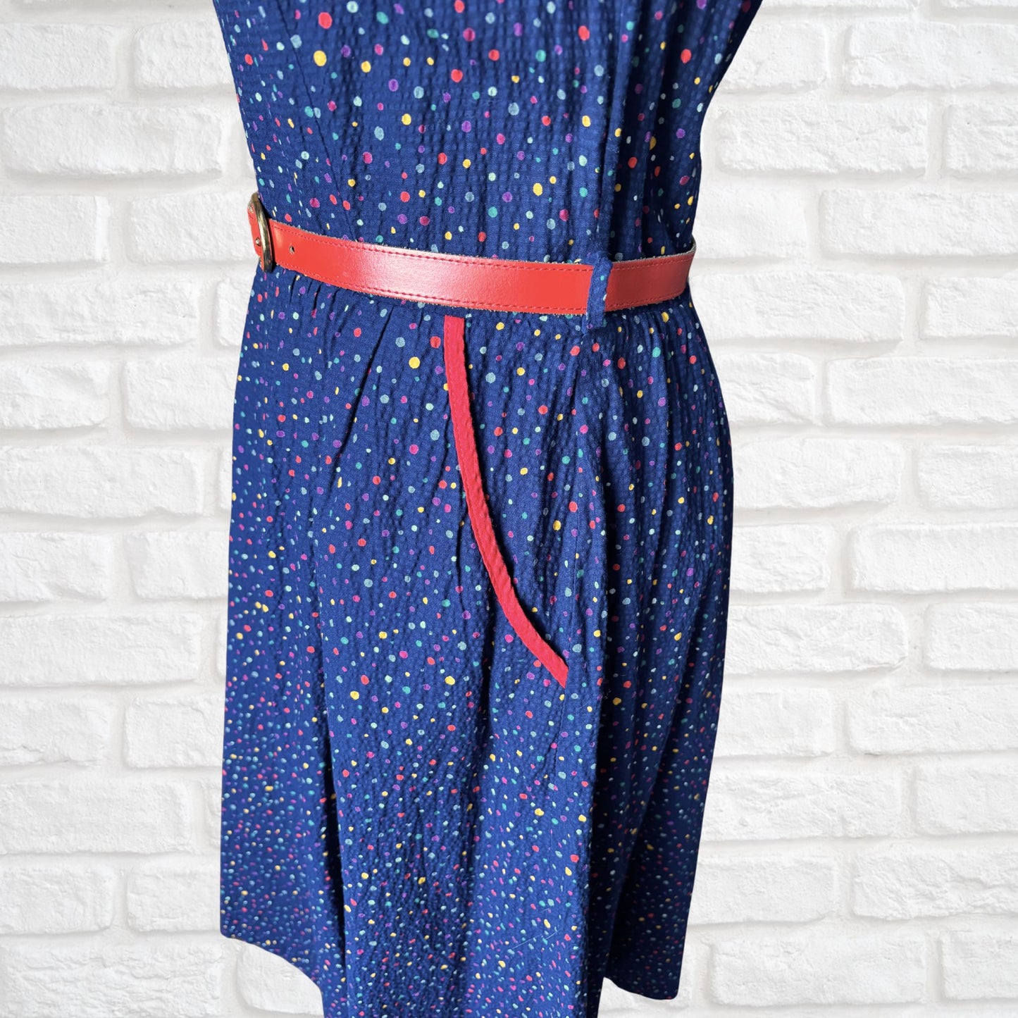 70s dark blue and rainbow polka dot sundress with red trim and belt. Approx UK size 10- 12