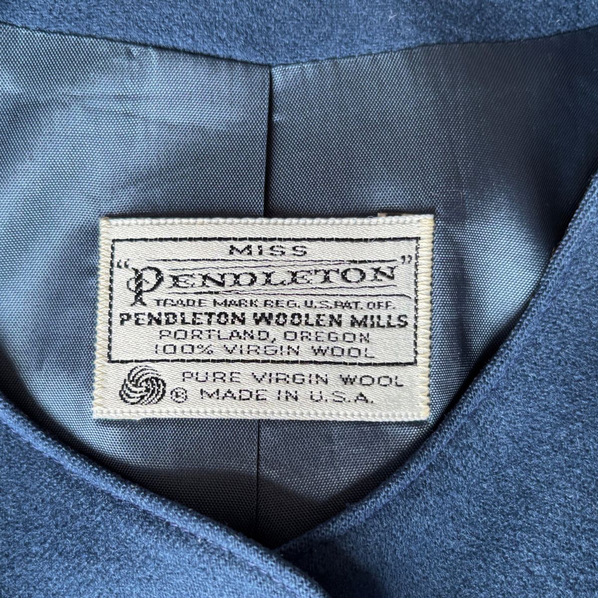Pendleton label on a blue fabric background
