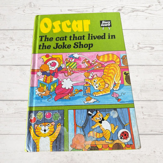 Oscar the cat that lived in the joke shop Book on a white surface 
