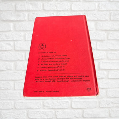 Red vintage ladybird book with list of titles 