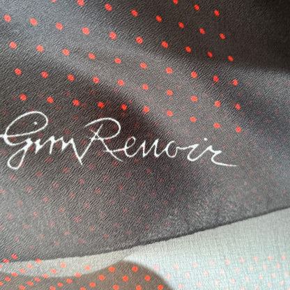 Black scarf  with red polka dots and Gim Renoir branding.
