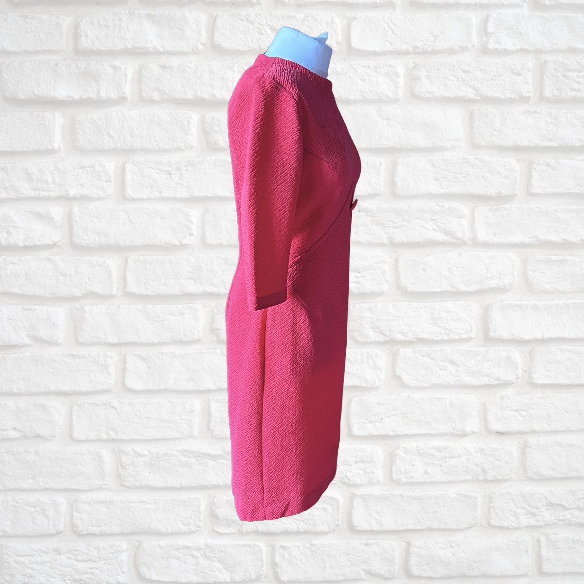 Side view of pink 60s pencil dress 
