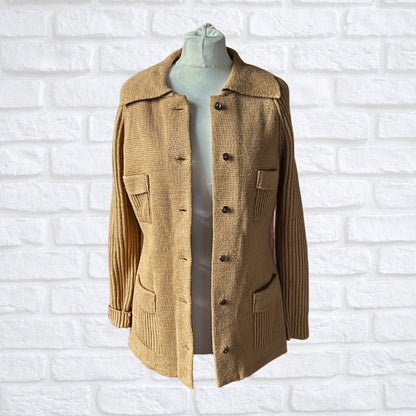Camel knitted cardigan on a white background 