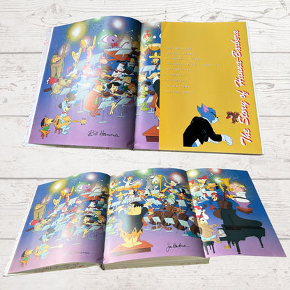 Open book with animated character illustrations on a wooden surface