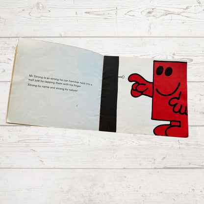 Mr strong using his finger to hammer a nail 