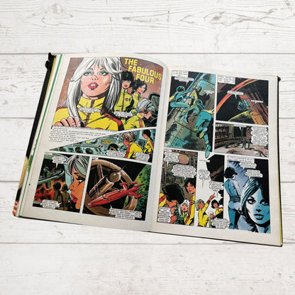 Vintage Diana Annual 1975 open on a white wood background 