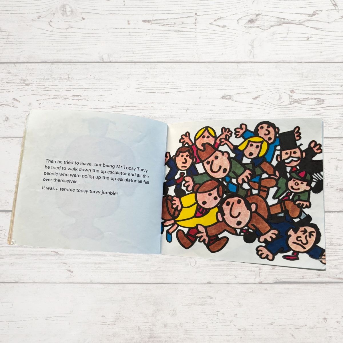 A crush of people falling over 