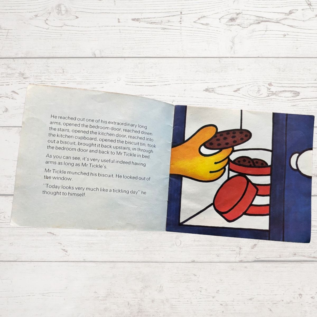 Mr Tickle getting a biscuit 