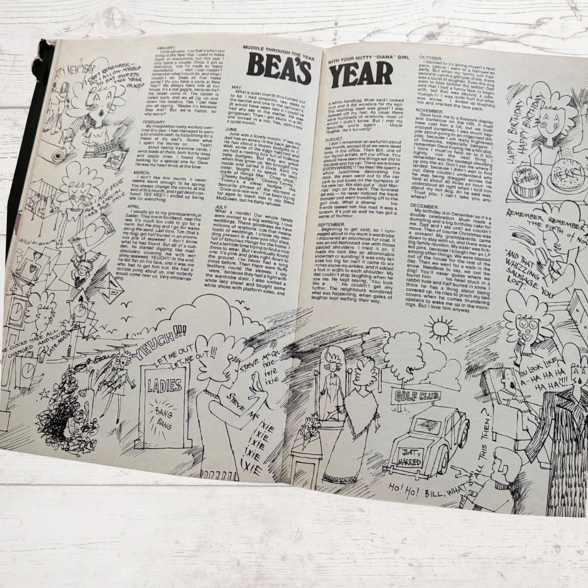Vintage Diana Annual 1975, open  on a white wood background 