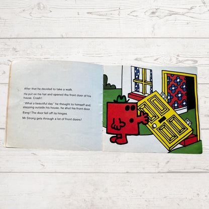 Mr Strong  with a broken door 