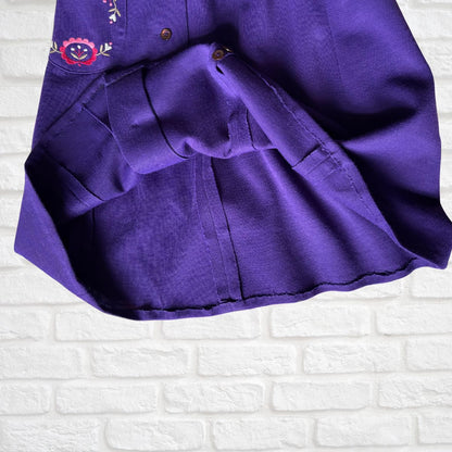 Hem of purple vintage  skirt 