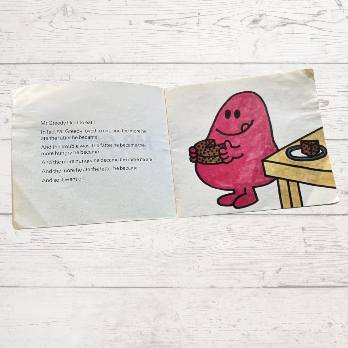 Mr Greedy eating a whole cake 