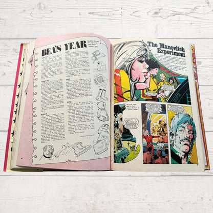 Vintage Diana annual 1976 open on a white wood background 