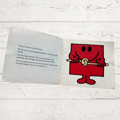 Mr Strong with  an iron bar 