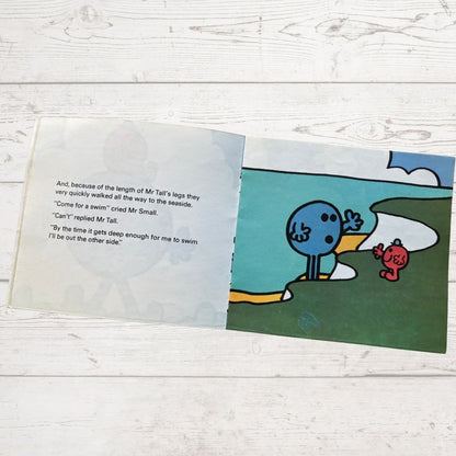 Mr Tall and and small on a cliff edge