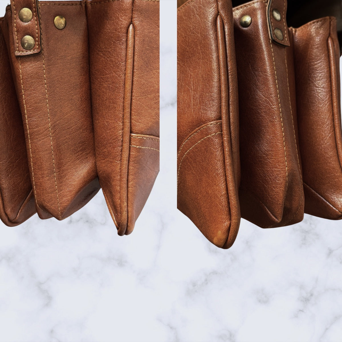 Close-up of a brown  bag with visible stitching on a marble background