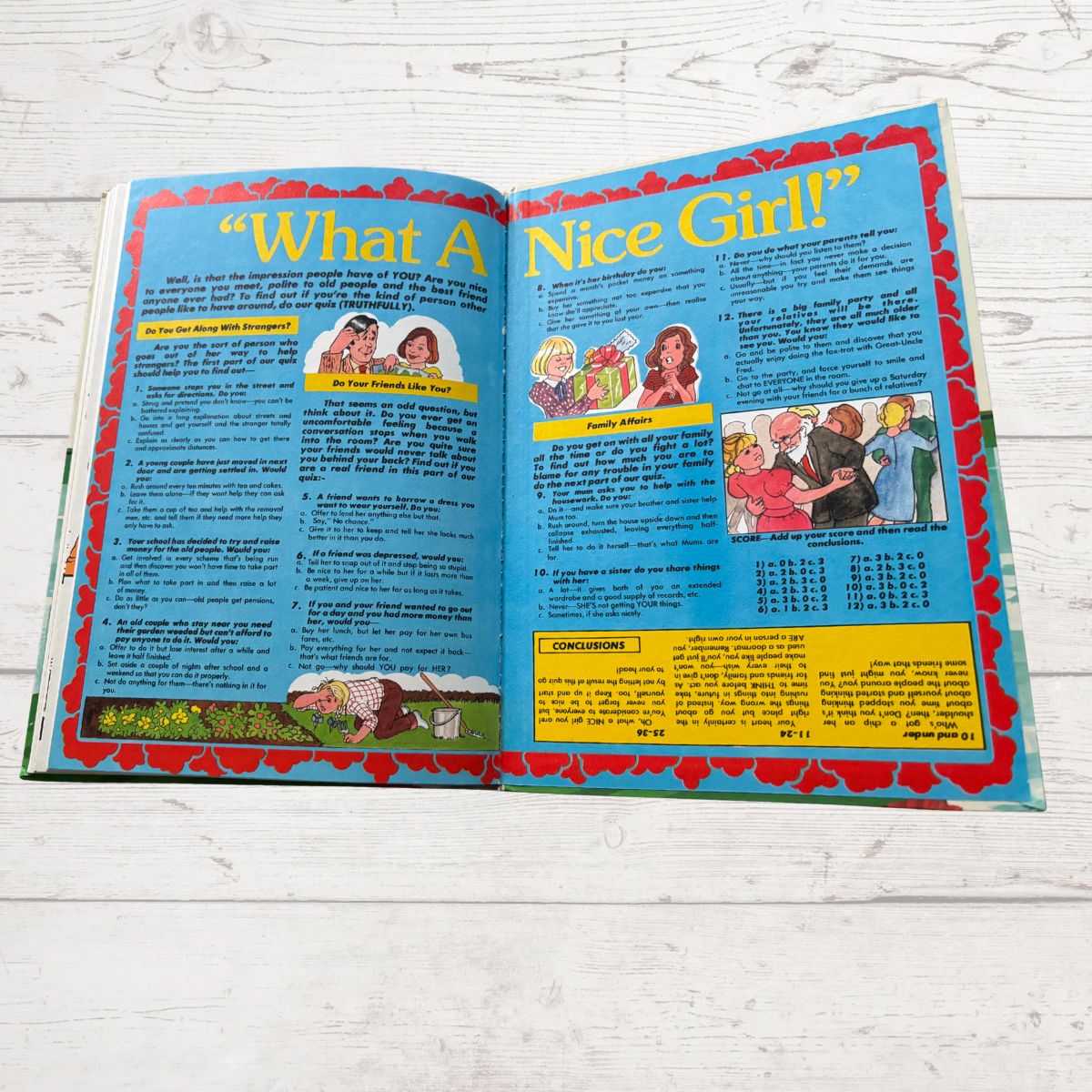 Mandy for Girls 1985 vintage annual, open  on a quiz page on a white background