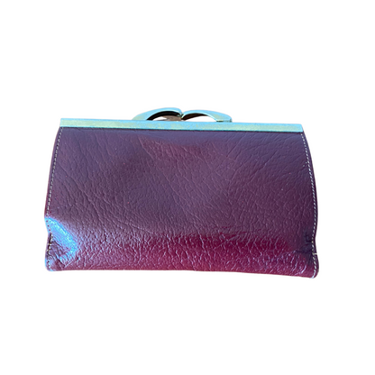 Vintage dark red leather purse with a kiss lock closure
