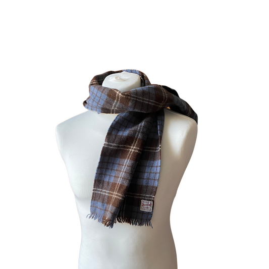 Experience the charm of British-made fashion with our Duggie Classic scarf in a stunning blue shade.