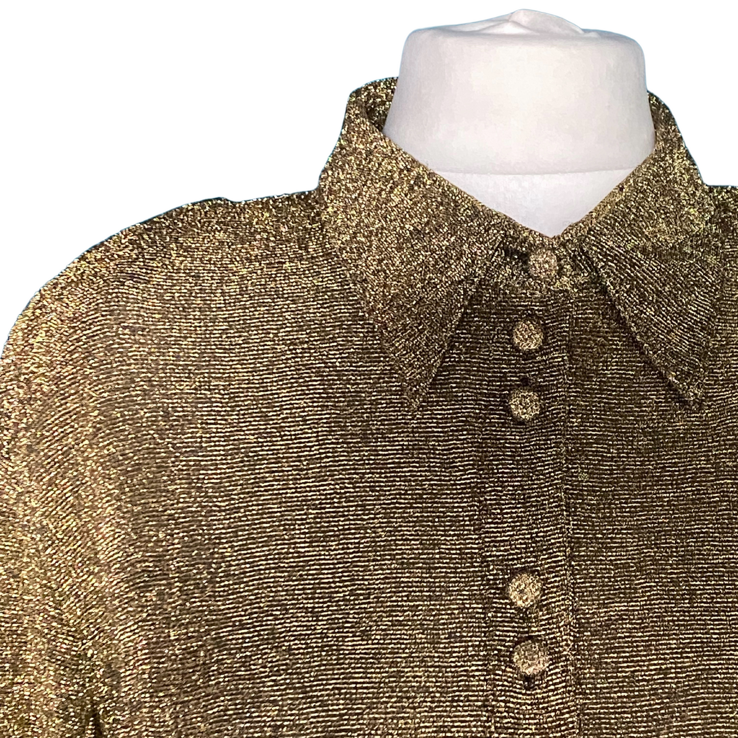 Step back in time with this 70s/80s gold glitter shirt, complete with a chic dagger collar.