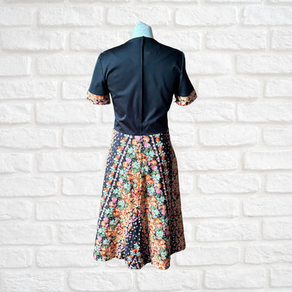 70s Black Fit & Flare Midi Dress with Fruity Floral Print . Approx UK size 10-12