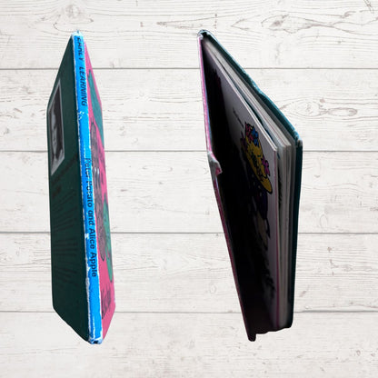 Close up of book boards  on a light wooden surface