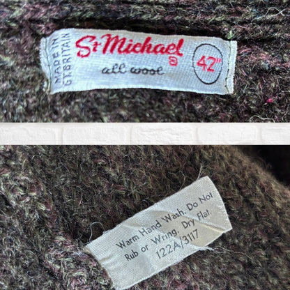 Two labels on a textured fabric background, one with 'St Michael' branding and size, the other with washing instructions.