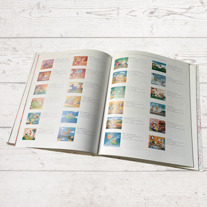 Open book with text and square illustrations