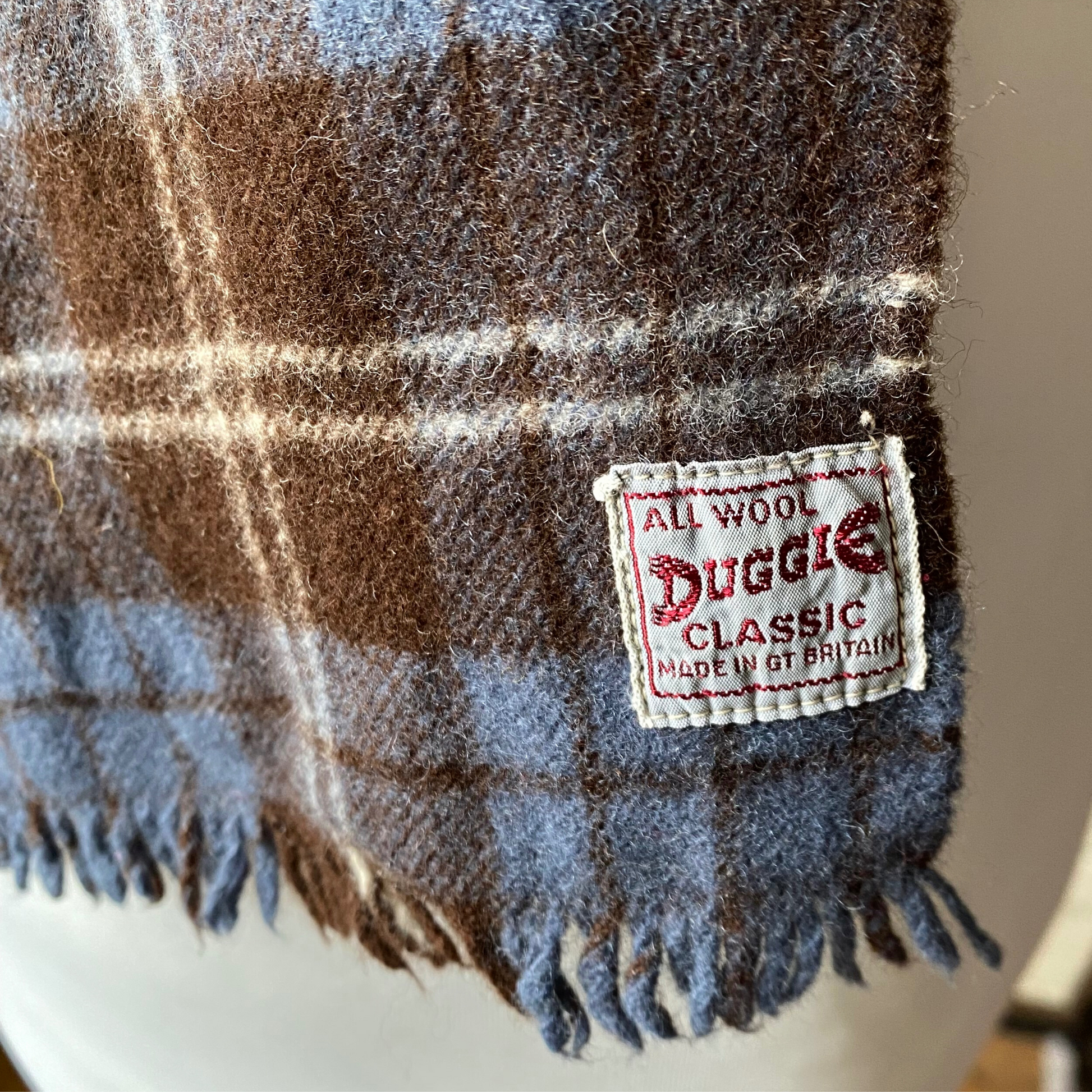 Close up of vintage Duggie scarf label 