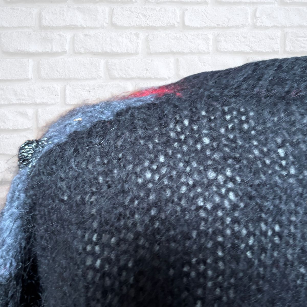 Close up of loose knit weave on an 80s knit