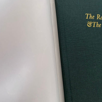 Green book with gold text on a white background