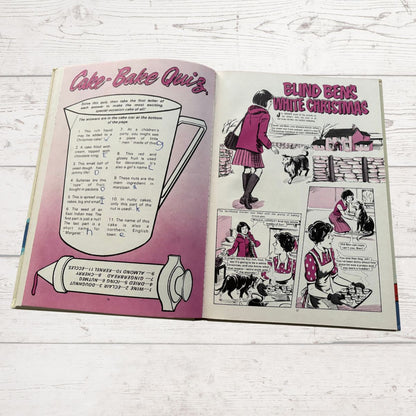 1981 Mandy for Girls Vintage Annual open on comic story page and quiz page on a white background