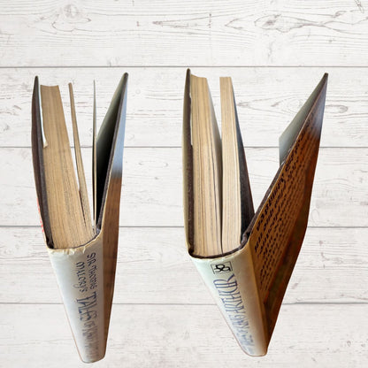 Spine close up of a book on a light wooden surface