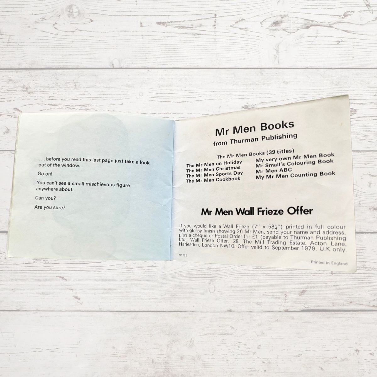 Promotional fly leaf cover  for Mr Men books from Thuman Publishing on a wooden surface