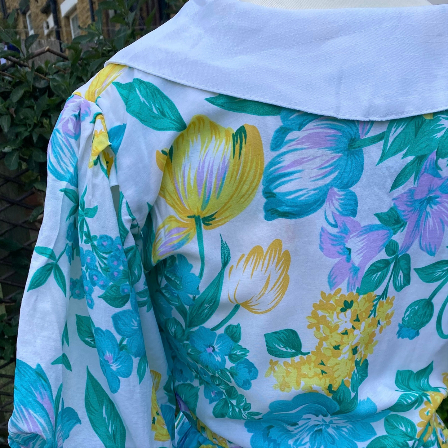 80s white, yellow and green cotton floral dress with puffed sleeves. Approx UK size 10-12