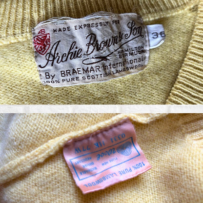 Close-up of vintage clothing labels on a textured fabric background