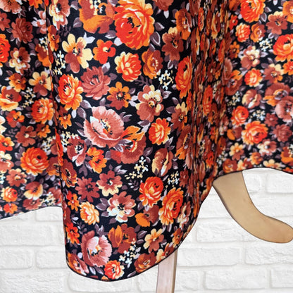 Floral patterned dress with orange and brown flowers 
