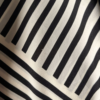 Close-up of black and white striped fabric texture