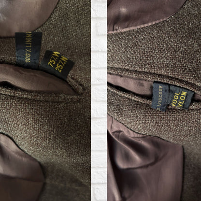 Close-up of a brown fabric with a label on a textured background
