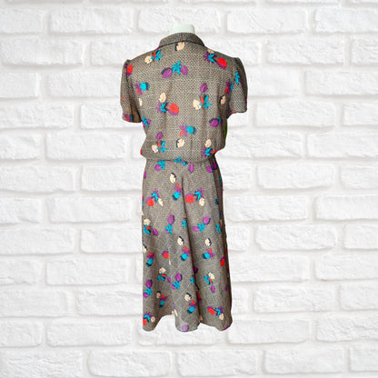 Vintage botanical print dress with flutter sleeves and pussy bow collar . Approx  U.K size 10-12