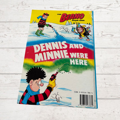 Comic book cover featuring characters from 'The Beano' with a winter scene.