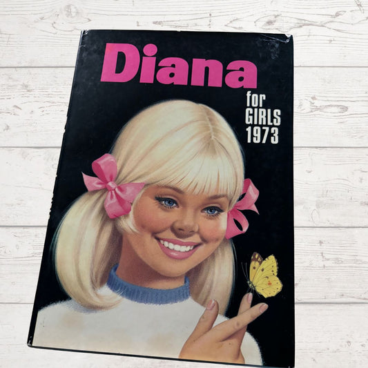 Vintage Diana Annual 1973 on a white wooden background 