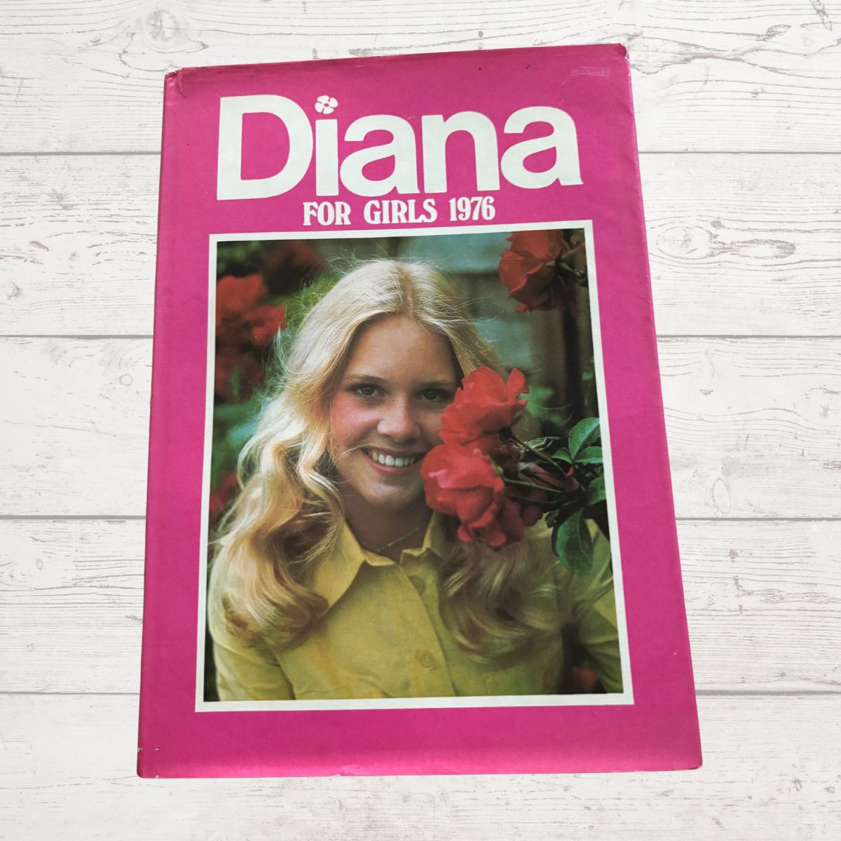 Vintage Diana annual 1976 On a white wood background 