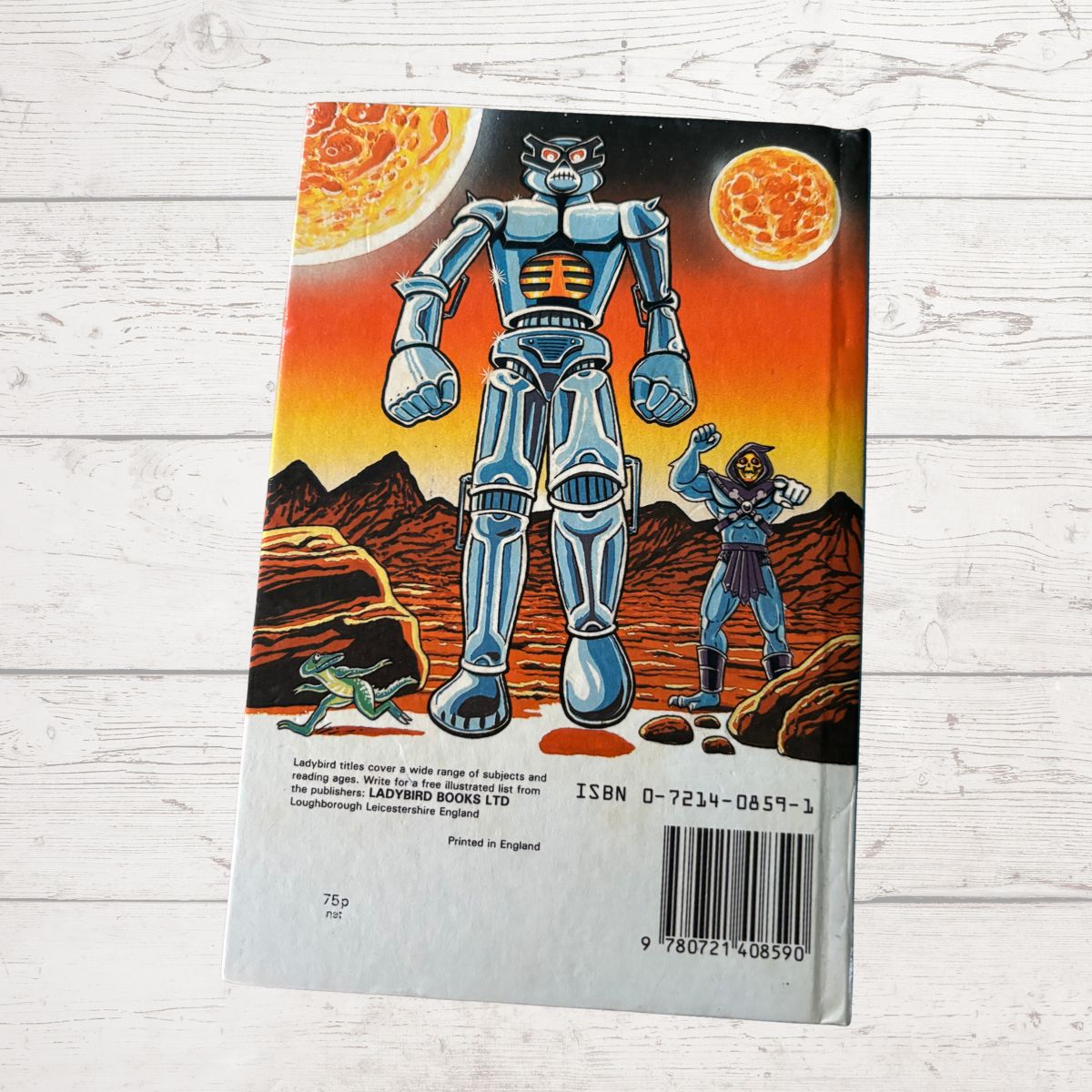 Book cover with robot illustration on a desert planet scene