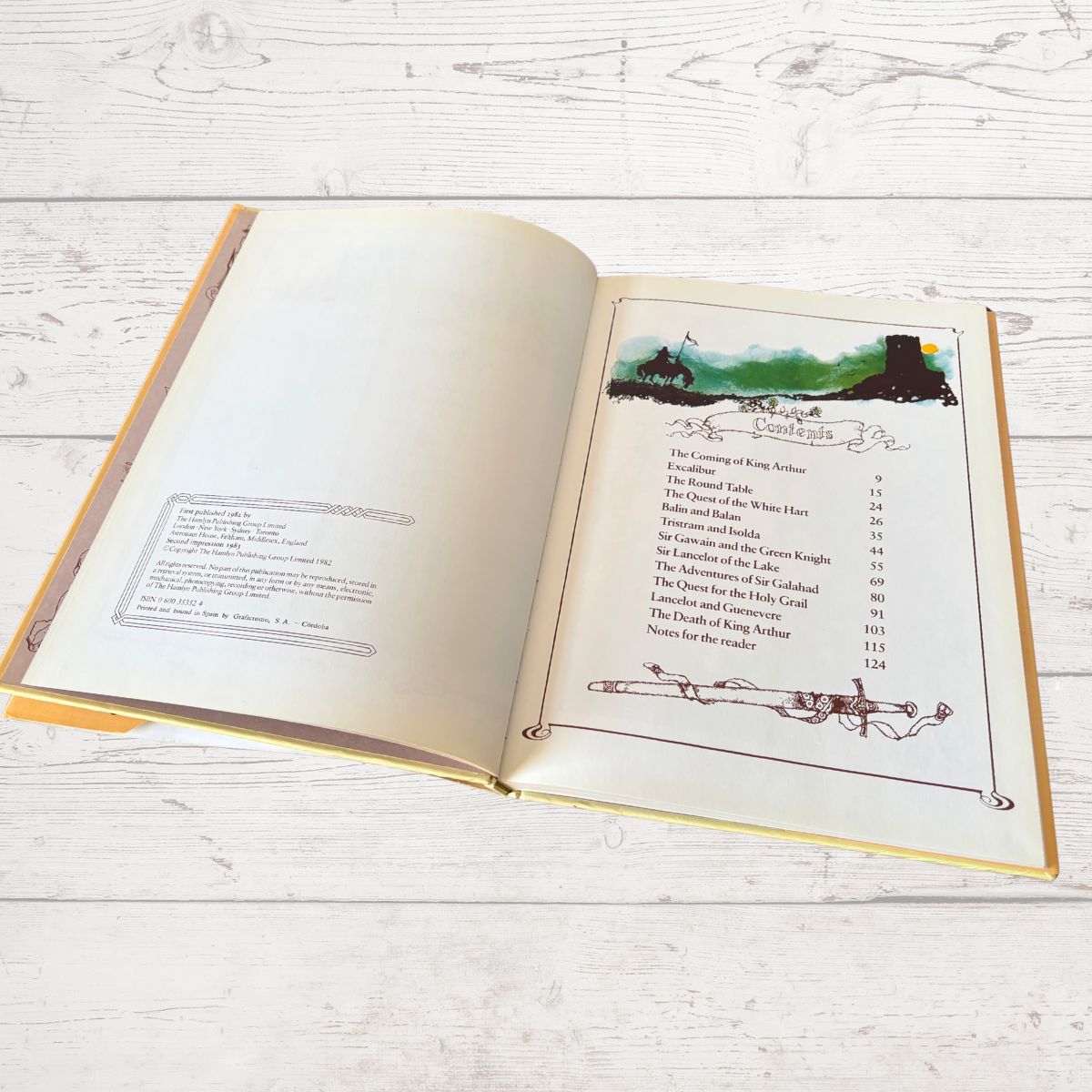 Vintage illustrated book of Arthurian legends On a white background 